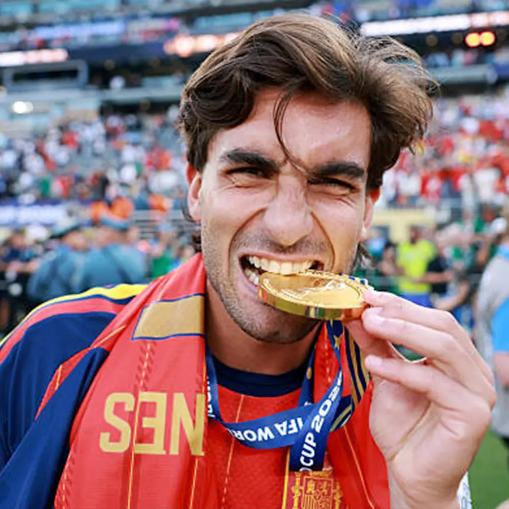Spain team receiving gold medals at 2026 World Cup final
