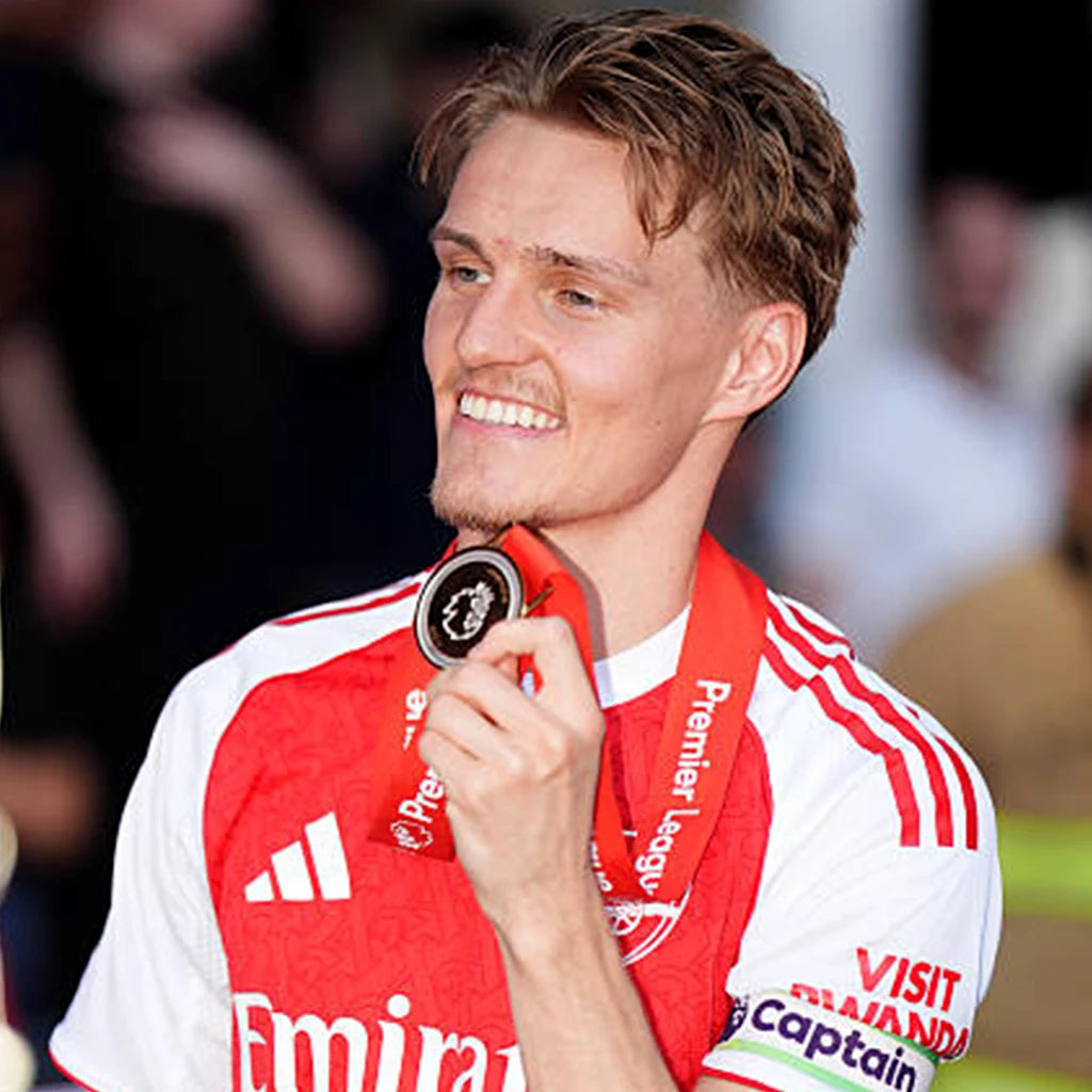 Football fans ordering keepsake medals after watching their team win