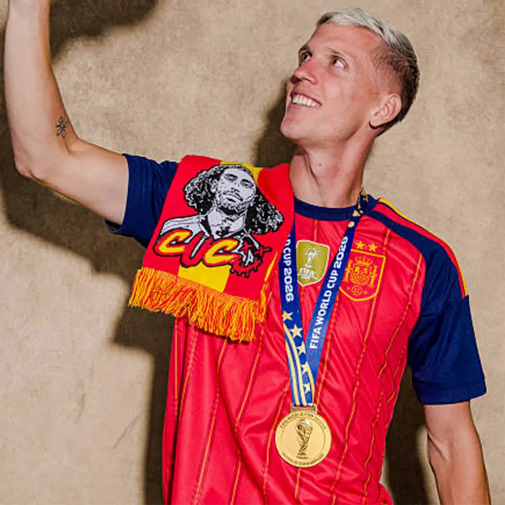 Spain player biting World Cup 2026 gold medal after final win