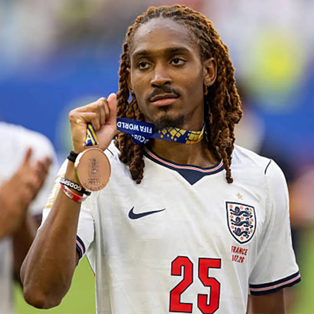 England national football team proudly holds the bronze medal after finishing third at the World Cup