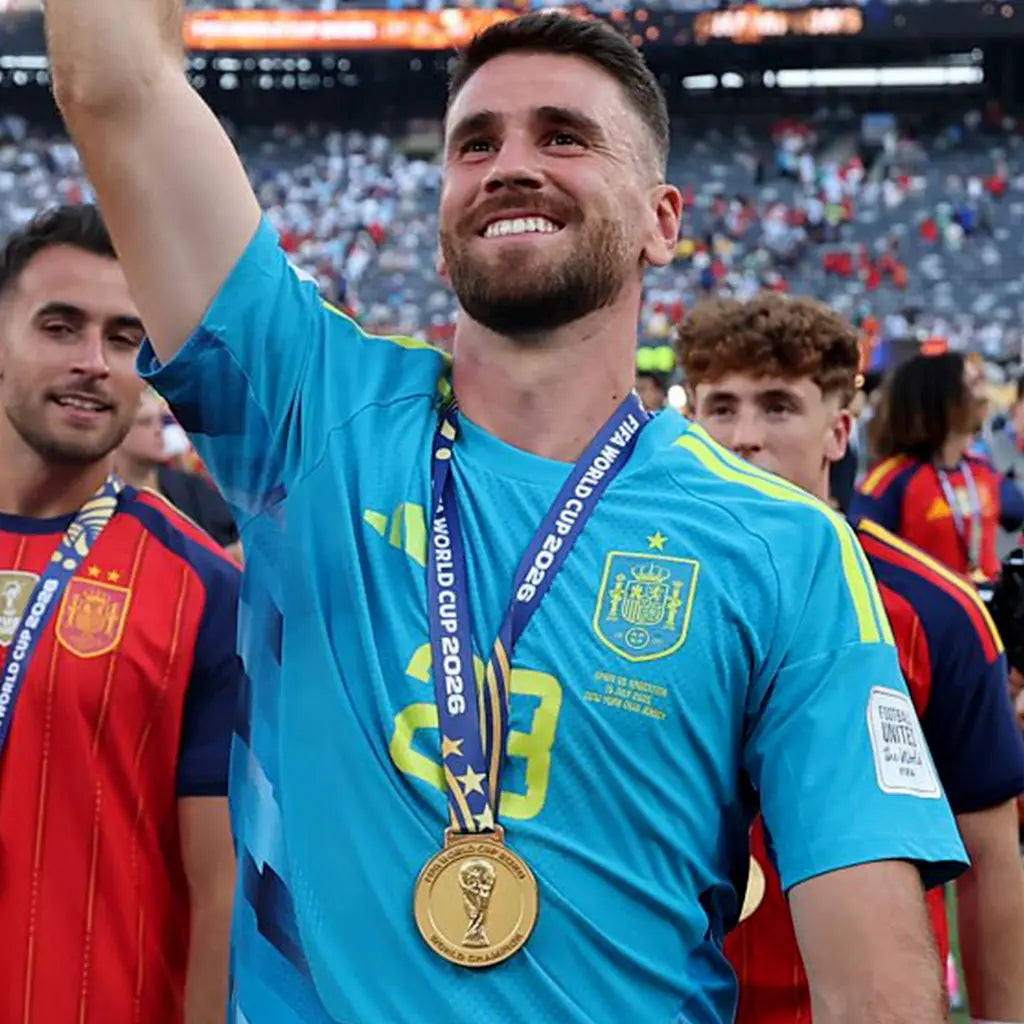 World Cup 2026 gold medal and FIFA trophy held together