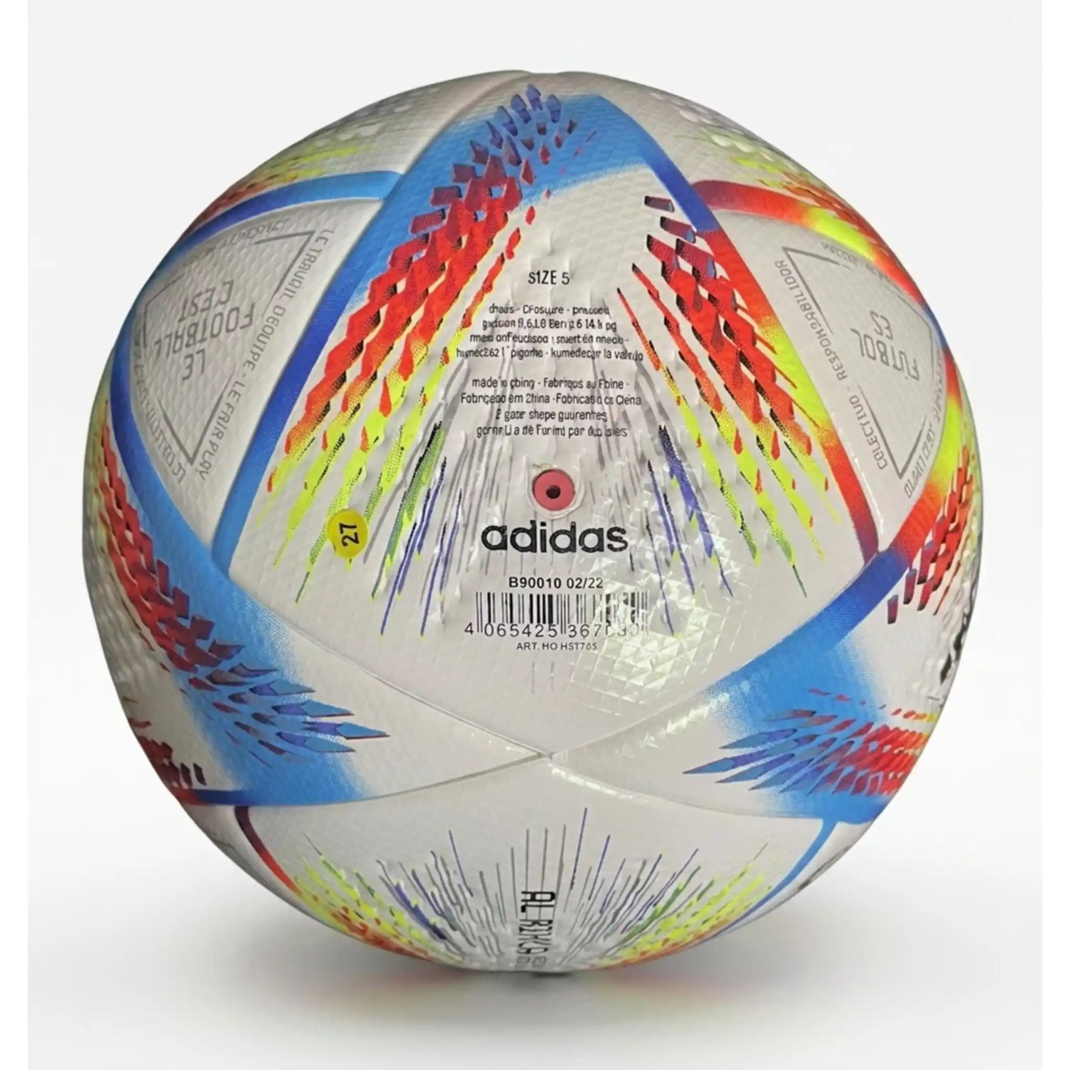 Al Rihla football placed on green grass pitch, World Cup 2022 match ball