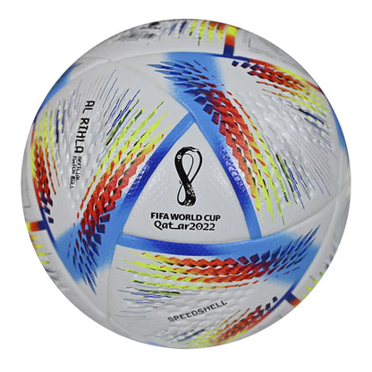Al Rihla match ball resting on stadium field during FIFA World Cup 2022