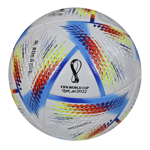 Al Rihla match ball resting on stadium field during FIFA World Cup 2022