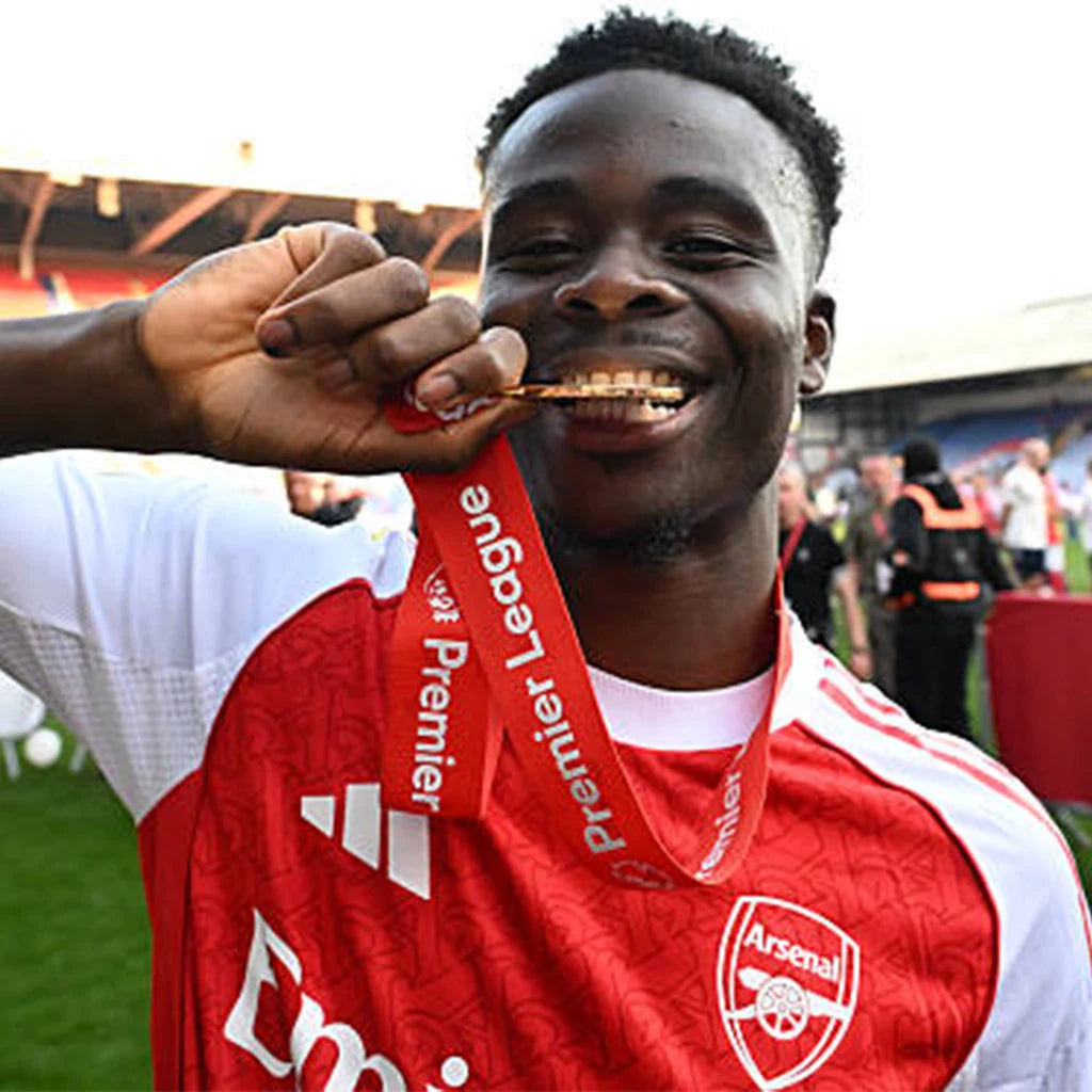 Football fans selecting victory medals in online shop