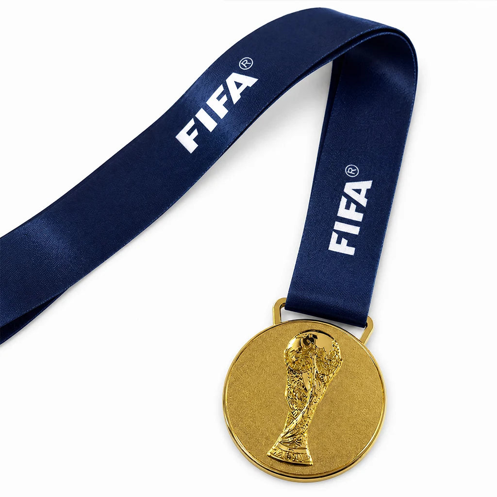 Spain football fan wearing 2010 World Cup champions gold medal